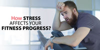 Man experiencing stress and fatigue during workout, showing how stress affects fitness progress and recovery.